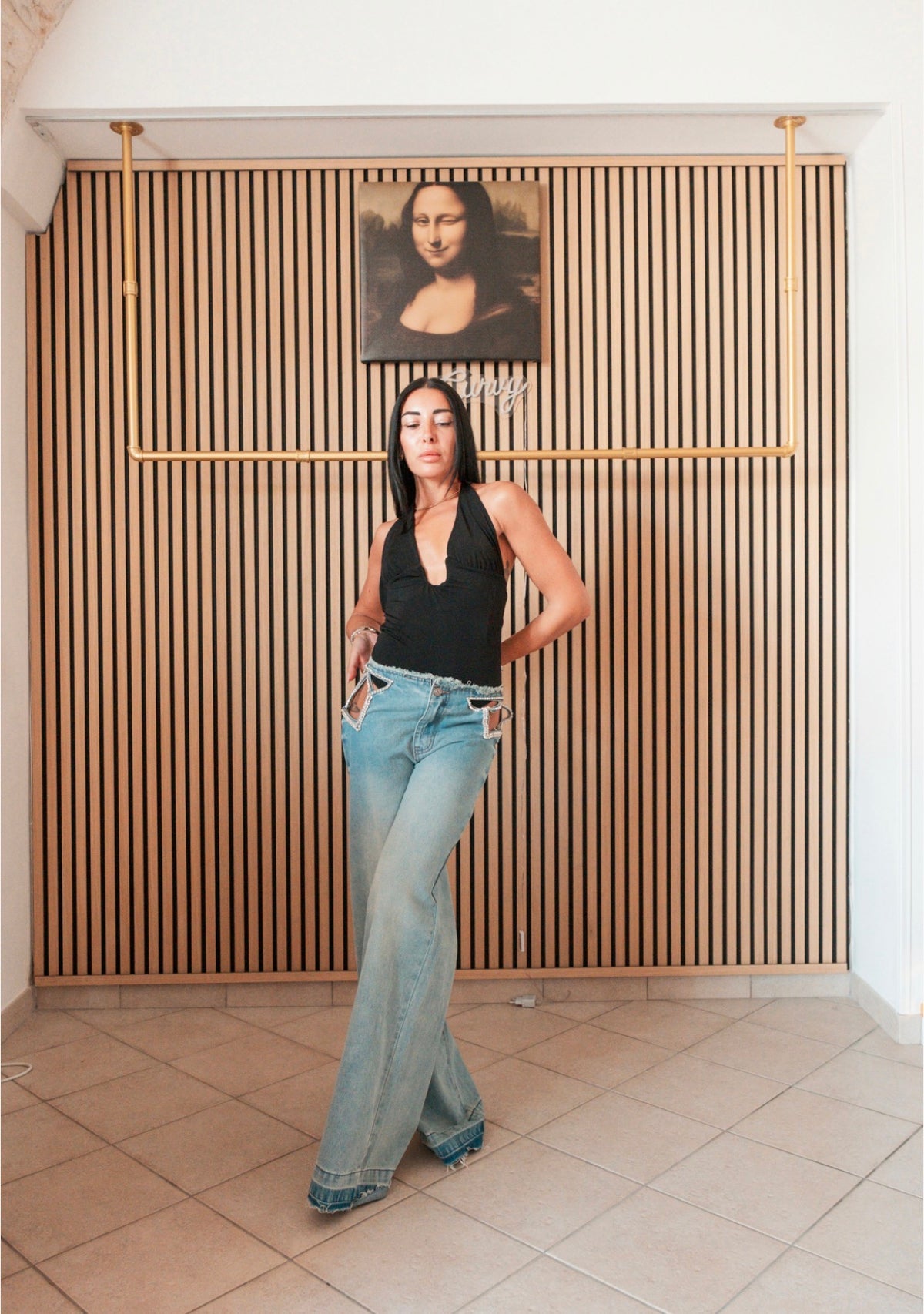 Jeans wide leg con dettagli cut-out gioiello
