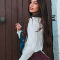 Blusa in pizzo bianco semitrasparente a maniche lunghe
